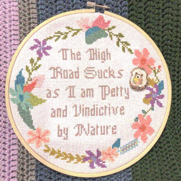 cross stitch of fancy lettering that reads 'the high road sucks as I am petty and vindictive by nature